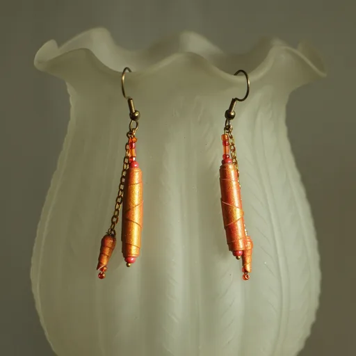 Paire de boucles d’oreilles alliant perles de rocaille rouges et orange, perles 